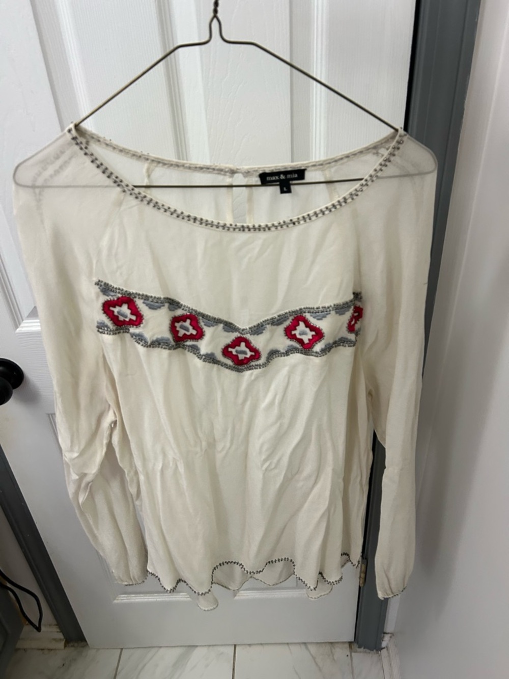 MAX and MIA beaded blouse.